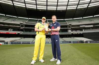 MELBOURNE, AUSTRALIA - JANUARY 13:  ODI captains Steve Smith and Eoin Morgan pose for a photo with the Gillette ODI series trophy on January 13, 2018 in Melbourne, Australia.  (Photo by Darrian Traynor/Getty Images)