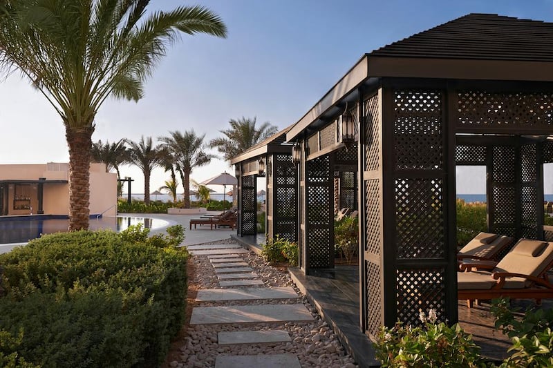 Poolside cabana at Waldorf Astoria Ras Al Khaimah. Courtesy Waldorf Astoria Hotels & Resorts