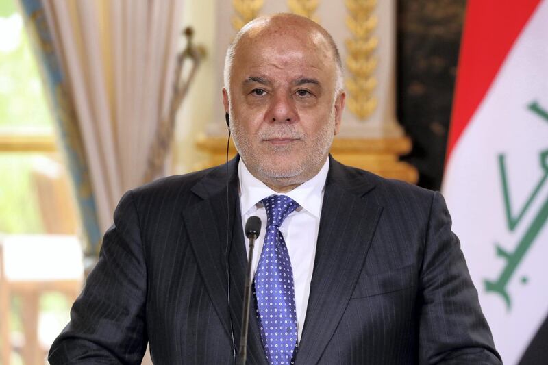 Iraqi Prime minister Haider al-Abadi gives a press conference following his meeting with French president at the Elysee palace in Paris, on October 5, 2017. / AFP PHOTO / POOL / ludovic MARIN