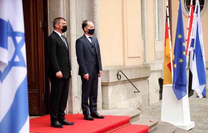 German Foreign Minister Heiko Maas stands at the entrance with Sheikh Abdullah bin Zayed before their meeting with Israeli counterpart Gabi Ashkenazi at Villa Borsig in Berlin, Germany.  Reuters