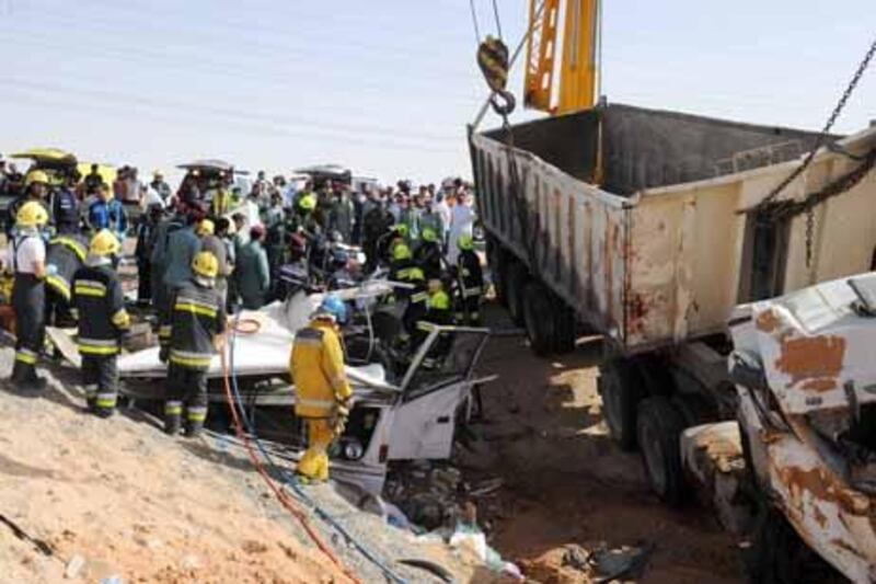 Twenty-four people were killed and 24 injured in an accident on the Old Truck Road in Al Ain after a lorry loaded with concrete overturned and landed on a bus.