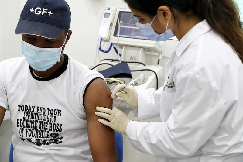 DUBAI, UNITED ARAB EMIRATES , March 11, 2021 – People getting their Covid vaccine at the  MBRU a community mobile health clinic near the Al Waha Community on Nad Al Hamar Road in Dubai. (Pawan Singh / The National) For News/Online/Instagram. Story by Nick Webster