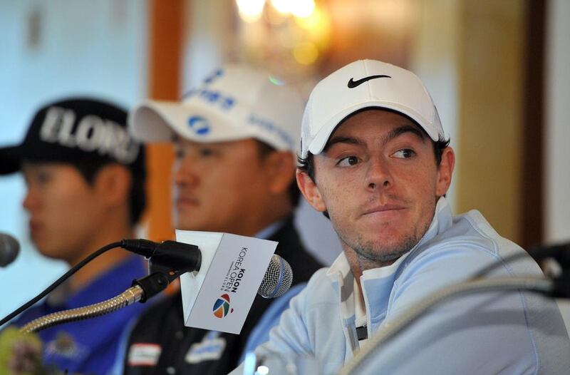After a month-long hiatus, Rory McIlroy, right, will be looking for his first win at the Korea Open. Jung Yeon-Je / AFP

