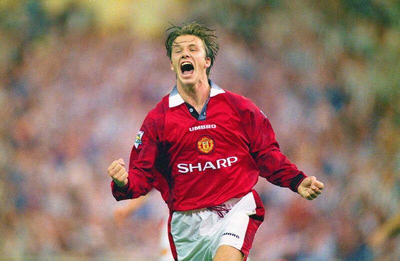 LONDON, UNITED KINGDOM - AUGUST 11: David Beckham of Manchester United celebrates after scoring the third goal in the 1996 FA Charity Shield between Manchester United and Newcastle United at Wembley Stadium on August 11, 1996 in London, England.  (Photo by Shaun Botterill/Allsport/Getty Images)