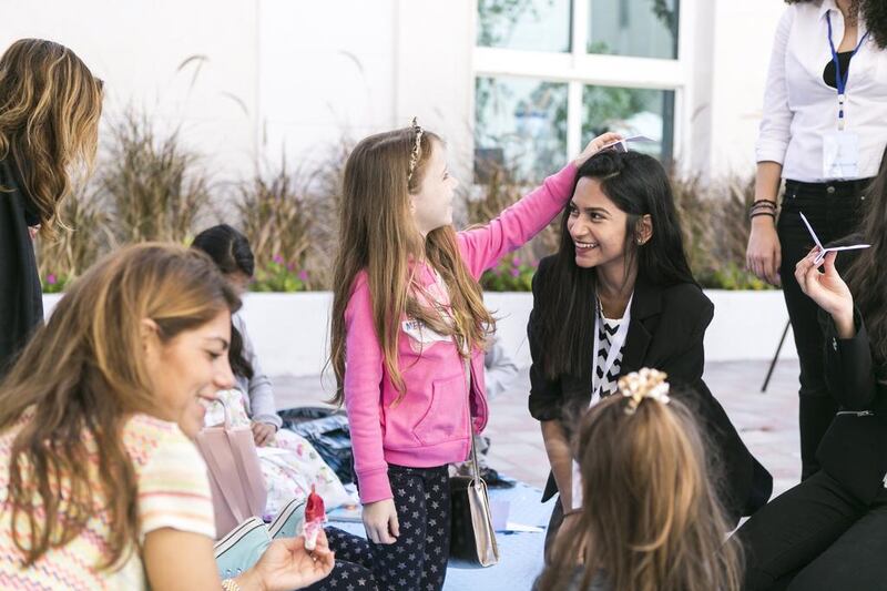 Visitors take part in LightHouse Arabia’s day of interactive workshops on Saturday. Reem Mohammed / The National