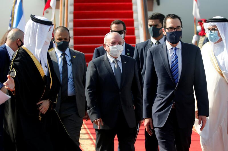 Israeli National Security Adviser Meir Ben-Shabbat and US Treasury Secretary Steve Mnuchin arrive in Muharraq, Bahrain.   Reuters