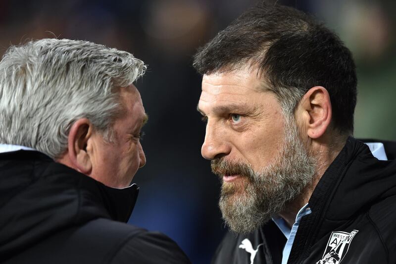 WEST BROMWICH, ENGLAND - MARCH 03: Steve Bruce, Manager of Newcastle United and shake hands with Slaven Bilic, Manager of West Bromwich Albion during the FA Cup Fifth Round match between West Bromwich Albion and Newcastle United at The Hawthorns on March 03, 2020 in West Bromwich, England. (Photo by Nathan Stirk/Getty Images)