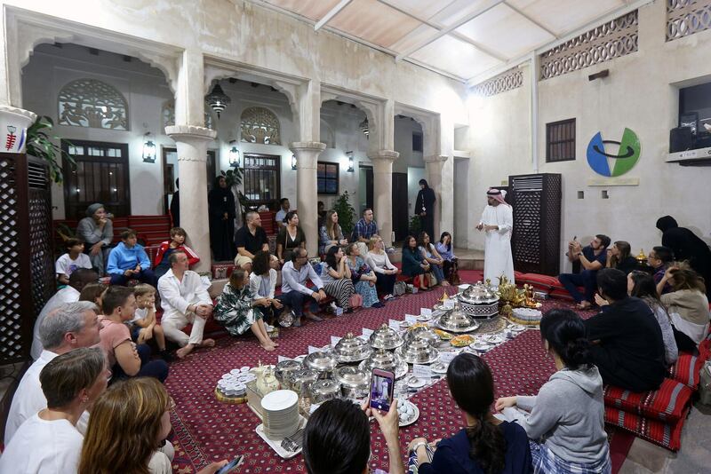 Rashid Al Tamimi, a Senior Cultural Presenter, talks to the foreign visitors and residents in the UAE about Ramadan and Emirati culture during the Muslim holy fasting month of Ramadan, at the Sheikh Mohammed Centre for Cultural Understanding (SMCCU) in Dubai, UAE.  REUTERS