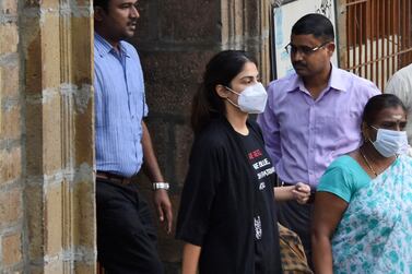 Rhea Chakraborty walks out of the Narcotics Control Bureau (NCB) office to be taken for a medical check in Mumbai, India, on September 8. AP