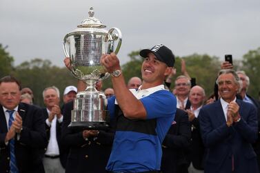 Brooks Koepka celebrates with the Wanamaker Trophy after winning the PGA Championship. USA Today