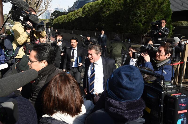 Lebanon's Ambassador to Japan Nidal Yehya (C) leaves after a court hearing on the case of former Nissan chairman Carlos Ghosn at the Tokyo District Court in Tokyo on January 8, 2019. - Former Nissan boss Carlos Ghosn said on January 8 he had been "wrongly accused and unfairly detained" at a high-profile court hearing in Japan, his first appearance since his arrest in November rocked the business world. (Photo by Kazuhiro NOGI / AFP)