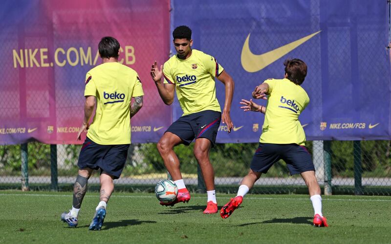 Ronald Araujo controls the ball during a training session at Ciutat Esportiva Joan Gamper. Getty Images