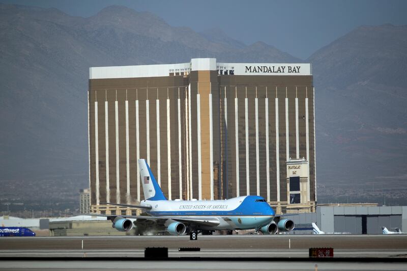 Air Force One carrying President Trump taxis on the runway past Mandalay Bay on Wednesday, Oct. 4, 2017, in Las Vegas. John Locher / AP Photo
