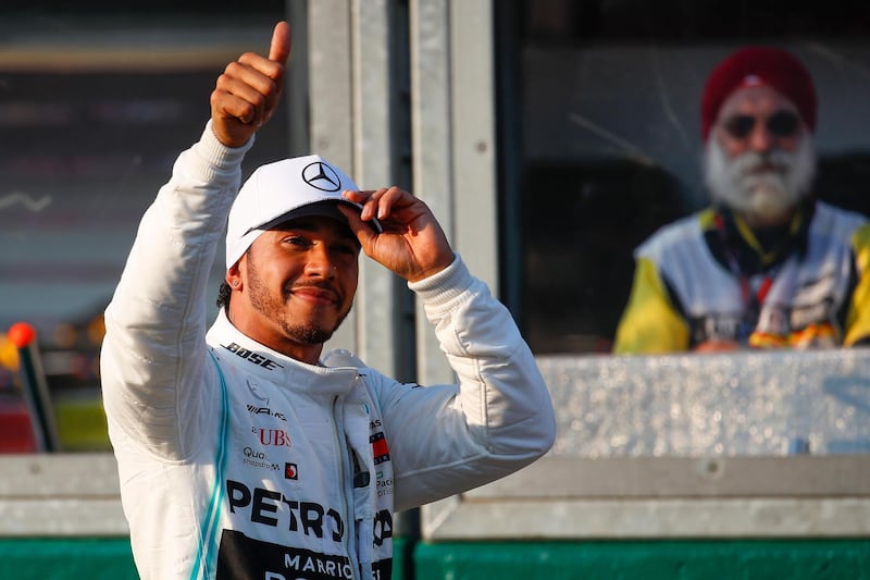 epa07441529 British Formula One driver Lewis Hamilton of Mercedes AMG GP reacts after taking pole position in qualifying ahead of the 2019 Formula One Grand Prix of Australia at the Albert Park Grand Prix Circuit in Melbourne, Australia, 16 March 2019. The 2019 Formula One Grand Prix of Australia will take place on 17 March 2019.  EPA/DIEGO AZUBEL
