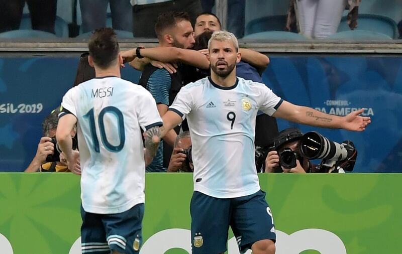 Sergio Aguero celebrates scoring Argentina's second goal with Lionel Messi. AFP