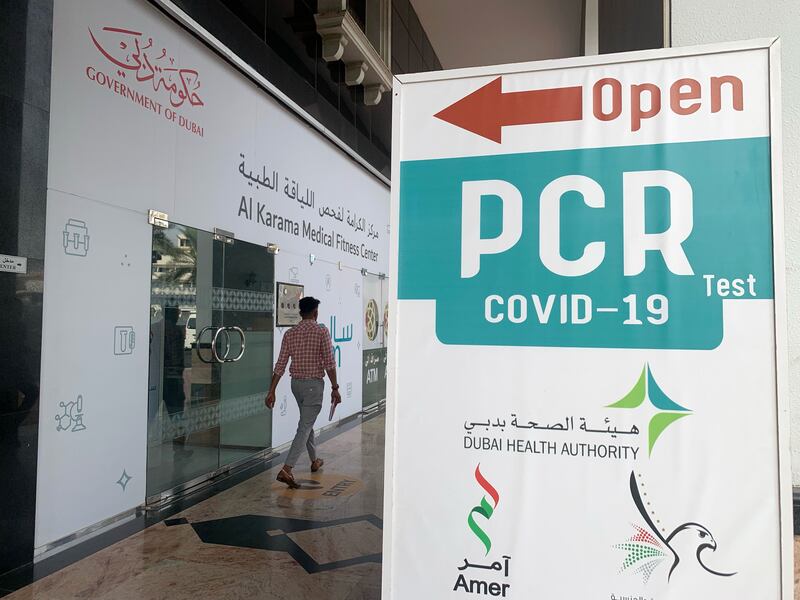 In Dubai, anyone with a positive PCR test for Covid-19 is a confirmed case. That means you have to isolate for 10 days, even if you do not have symptoms. Chris Whiteoak / The National