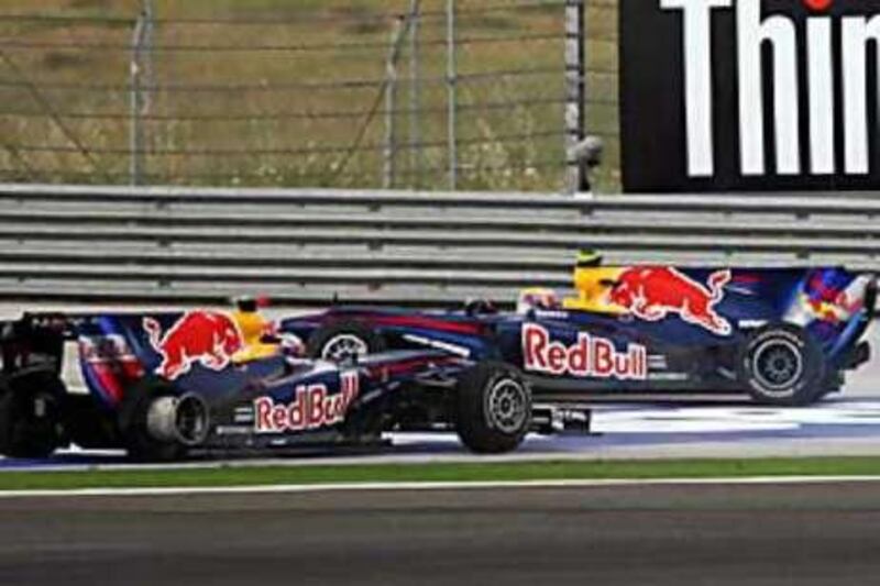 Sebastian Vettel, left, and his Red Bull teammate Mark Webber come to a stop after their collision in the Turkish Grand Prix.