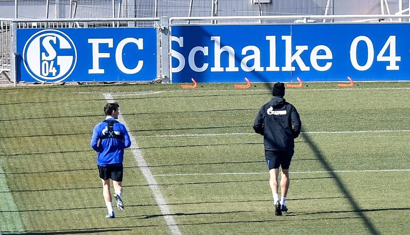 Schalke players take part in drills at the club's training ground in Gelsenkirchen while maintaining social distancing due to the coronavirus outbreak. AP Photo