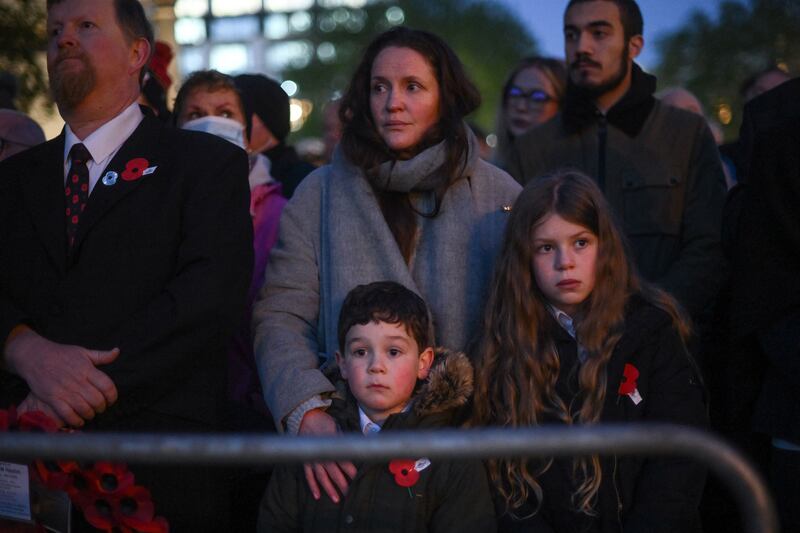 Members of the public attend the service at Hyde Park Corner. AFP