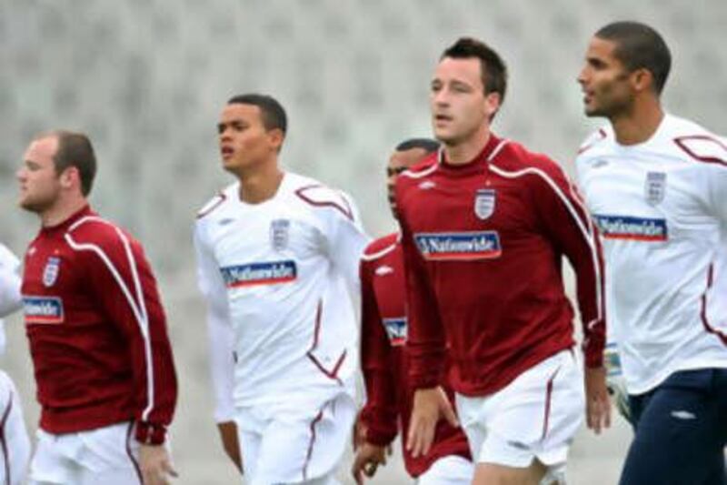 The England captain John Terry, second from right, goes through his training paces with the rest of the England squad.