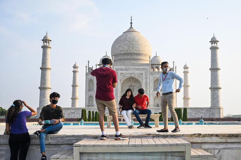 Tourists visit the Taj Mahal. AFP
