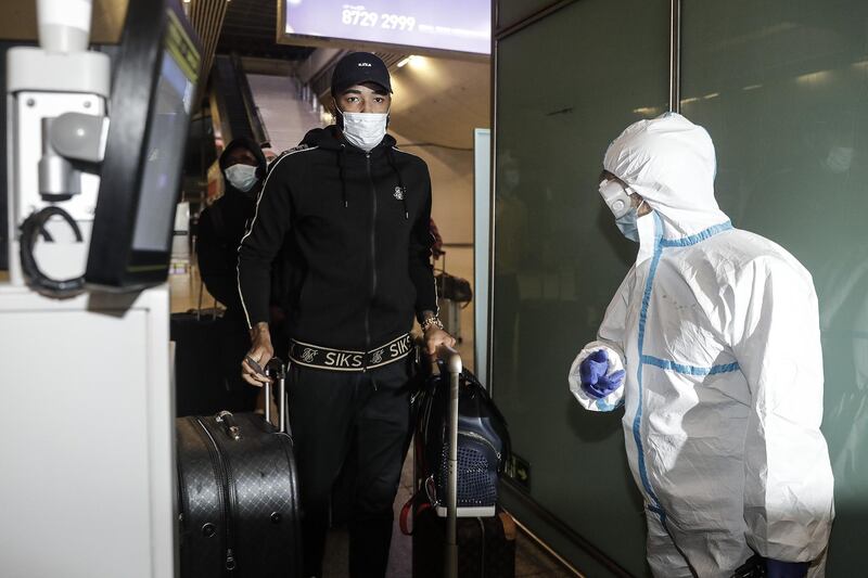 Players of the Wuhan Zall football team arrive at Wuhan railway station in Hubei, China. The  team left Wuhan on January 5, 2020 for a training session in Guangzhou of Guangdong Province. Since then they have spent 104 days training in Malaga, Spain and other cities in Guangdong before finally returning. Getty