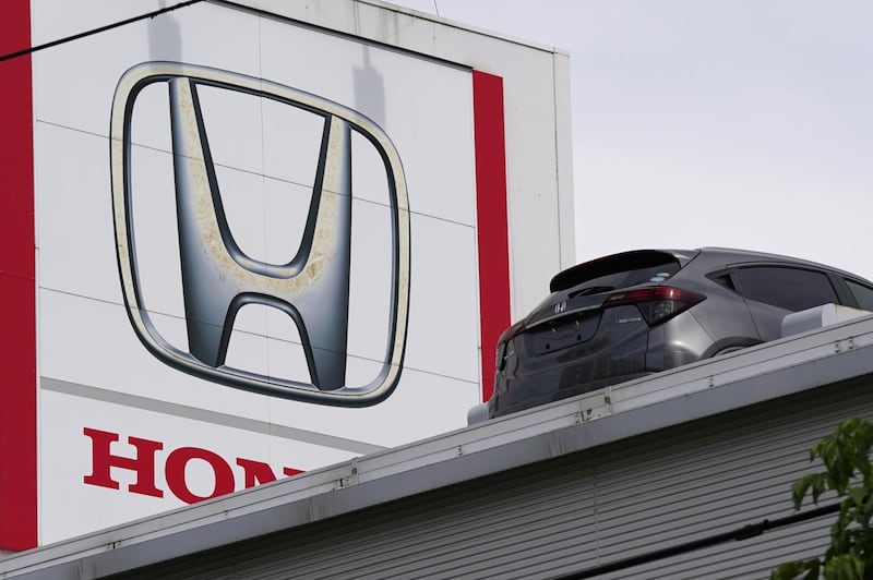A Honda Motor Co. Vezel Hybrid vehicle is pdisplayed at a dealership in Tokyo, Japan, on Sunday, May 10, 2020. Global automakers and suppliers are on track to get at least $100 billion of bank financing as the coronavirus pandemic hammers car sales. Photographer: Toru Hanai/Bloomberg