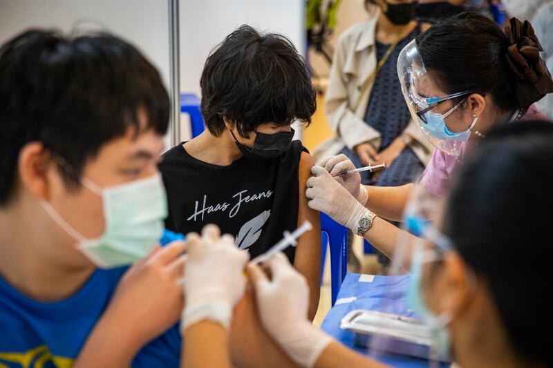 Teenagers receive a dose of the Pfizer Covid-19 vaccine in Bangkok, Thailand. Thailand is vaccinating 12- to 18-year-old pupils with the consent of their parents.  Getty Images