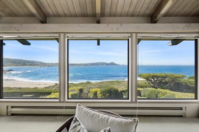 Glass walls and windows ensure views are enjoyed from every part of the house. Photo: Sotheby’s International Realty, Carmel