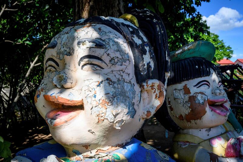 Decaying Asian dolls are seen at the Elephant Village in Ayutthaya, Thailand. AFP