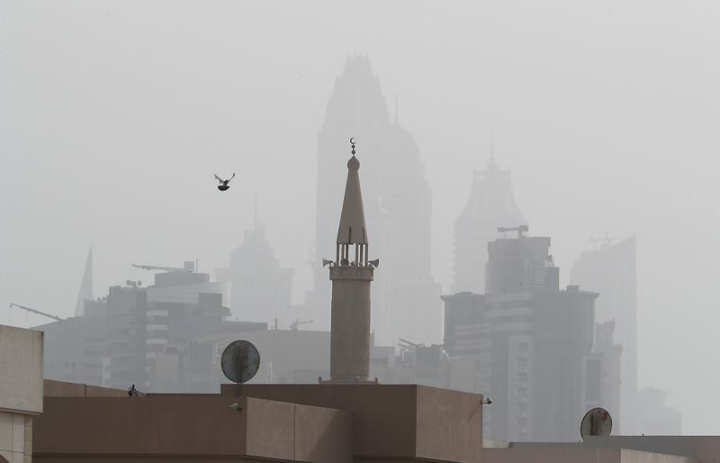 Hazy conditions in Barsha Heights on Monday evening due to dust. Pawan Singh / The National