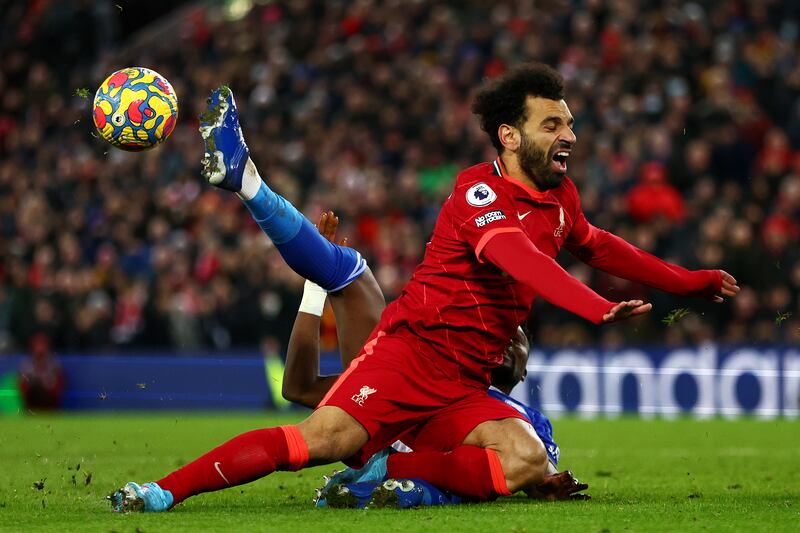 Liverpool attacker Mohamed Salah reacts to a tackle. Getty