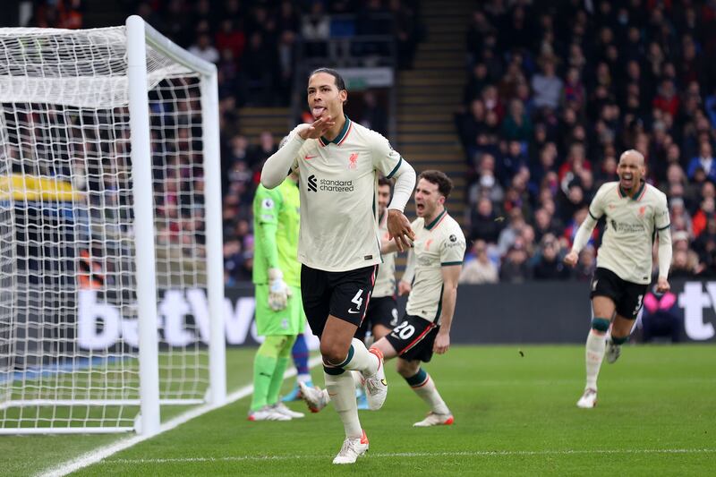 Virgil van Dijk celebrates after scoring Liverpool's first. Getty