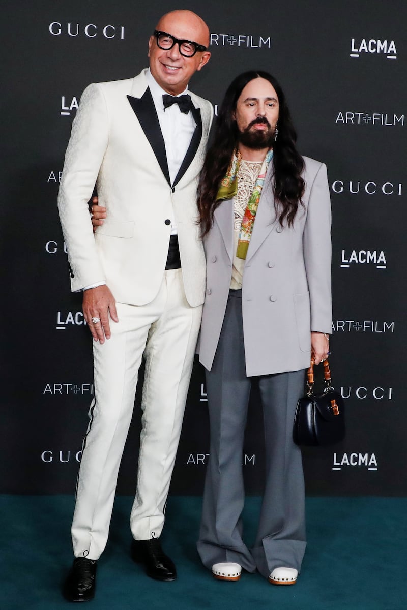 Gucci's chief executive Marco Bizzarri with creative director Michele. Reuters