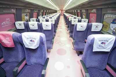 This handout picture taken on June 25, 2018 and released by West Japan Railway on June 26, 2018 shows the interior of a Shinkansen train adorned with images of popular character Hello Kitty, at the Hakata car maintenance center in Fukuoka prefecture.
Resplendent in shocking pink, a sleek "Hello Kitty" bullet train, complete with special carriages festooned with images of the global icon from Japan, has been unveiled before chugging into service this week starting June 25. / AFP PHOTO / West Japan Railway / Handout / -----EDITORS NOTE --- RESTRICTED TO EDITORIAL USE - MANDATORY CREDIT "AFP PHOTO / West Japan Railway" - NO MARKETING - NO ADVERTISING CAMPAIGNS - DISTRIBUTED AS A SERVICE TO CLIENTS - NO ARCHIVES