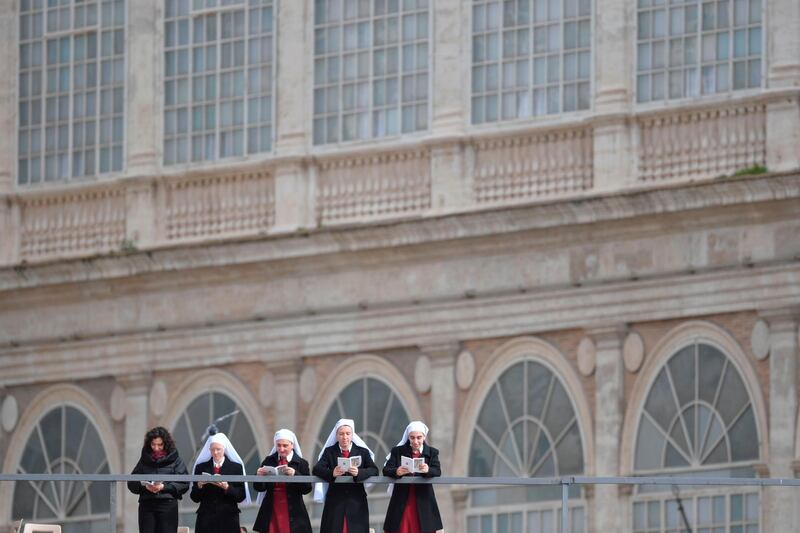 Nuns follow Easter mass celebrations by Pope Francis at St Peter's Square in the Vatican. Andreas Solaro / AFP
