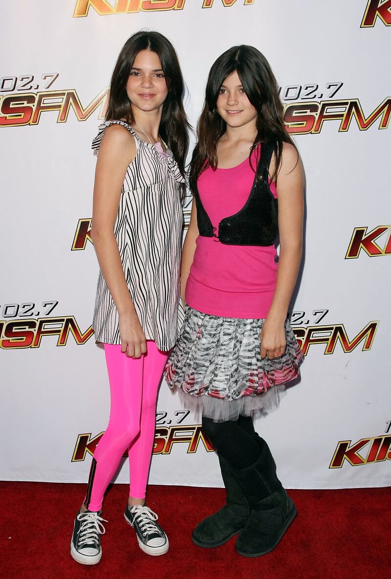 Kendall and Kylie Jenner, in a zebra print skirt and pink top, arrive at KIIS-FM's 2008 Wango Tango concert held at the Verizon Wireless Amphitheater on May 10, 2008 in Irvine, California. AFP