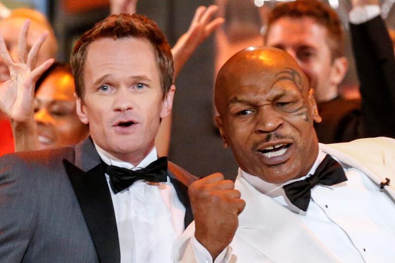 Host Neil Patrick Harris (L) and retired boxer Mike Tyson perform during the opening number of American Theatre Wing's annual Tony Awards in New York June 9, 2013. REUTERS/Lucas Jackson (UNITED STATES - Tags: ENTERTAINMENT) (TONYS-SHOW) *** Local Caption ***  AAL112_STAGE-TONYAW_0610_11.JPG