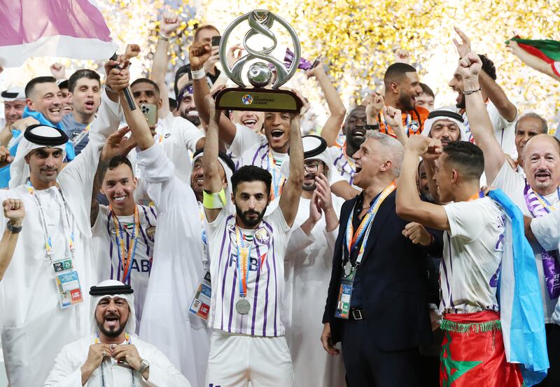 Al Ain celebrate their victory at Hazza Bin Zayed Stadium.