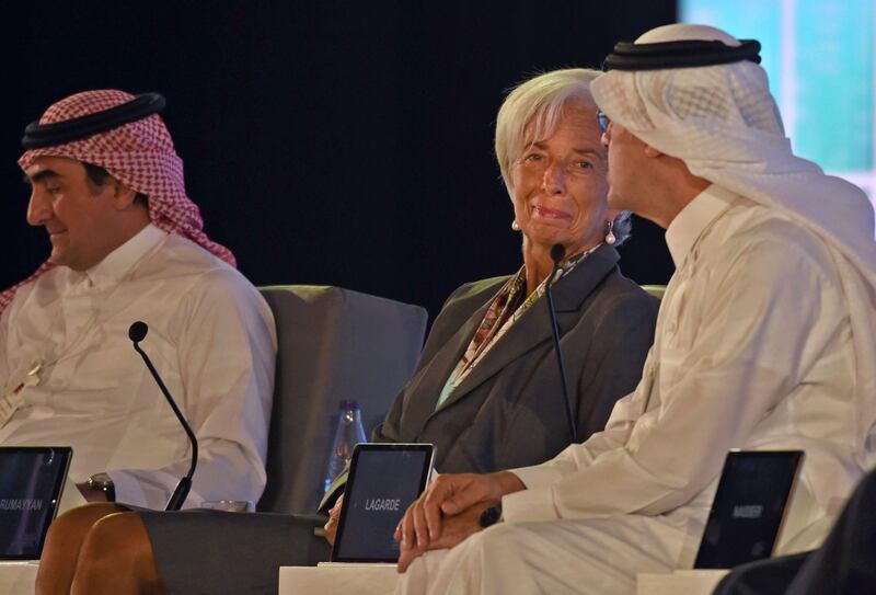 Managing director of the International Monetary Fund Christine Lagarde, centre, looks at the president and CEO of the Saudi Aramco Amin Nasser, right, during the Future Investment Initiative (FII) conference in Riyadh, on October 24, 2017. The head of oil giant Saudi Aramco said that a lack of recent investments in the oil sector could lead to a shortage of supplies.  Fayez Nureldine / AFP