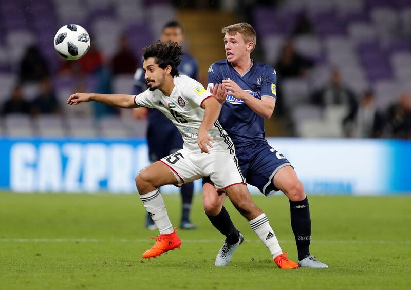 Auckland City’s Callum McCowatt in action with Al Jazira’s Khalfan Mubarak. Reuters