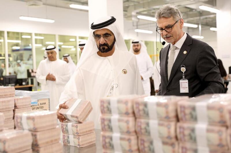 Sheikh Mohammed bin Rashid, Vice President and Ruler of Dubai, inspects currencies at the UAE’s first banknote printing plant at Khalifa Industrial Zone Abu Dhabi on Saturday. Wam