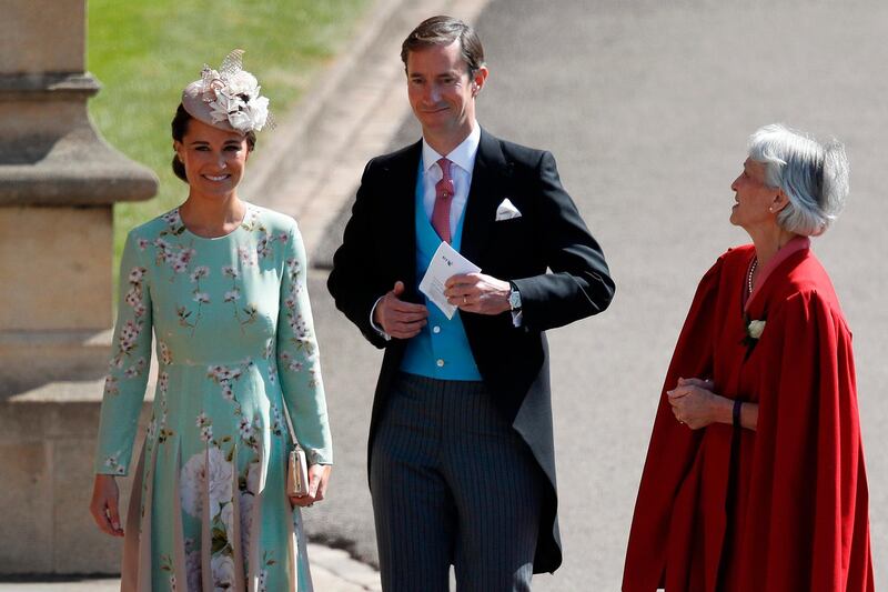 Pippa Middleton and her husband James Matthews arrive for the wedding ceremony of Britain's Prince Harry and Meghan Markle at St George's Chapel, Windsor Castle, in Windsor. Odd Andersen / AFP