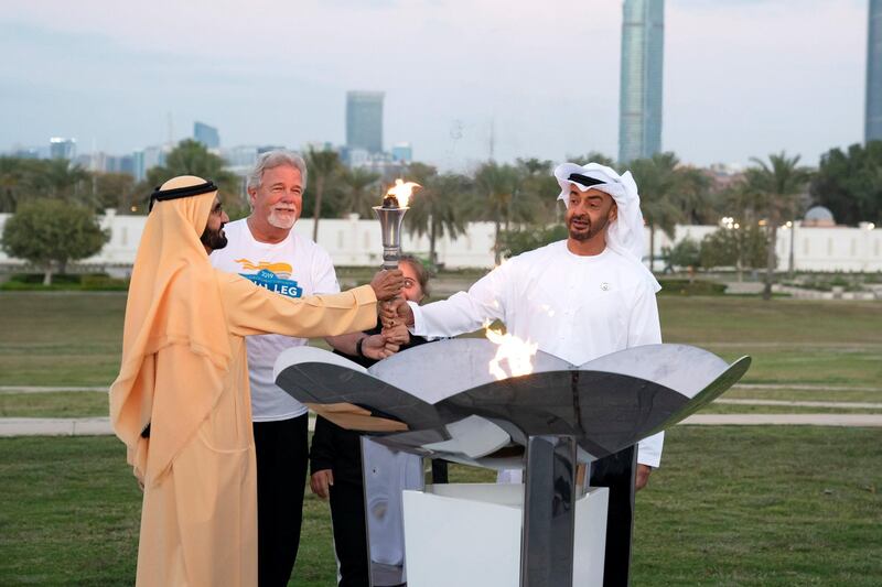 ABU DHABI, UNITED ARAB EMIRATES - March 10, 2019: HH Sheikh Mohamed bin Zayed Al Nahyan, Crown Prince of Abu Dhabi and Deputy Supreme Commander of the UAE Armed Forces (R) and HH Sheikh Mohamed bin Rashid Al Maktoum, Vice-President, Prime Minister of the UAE, Ruler of Dubai and Minister of Defence (L), stand for a photograph holding the Special Olympics torch, during the Determination Retreat at the Presidential Palace.

( Ryan Carter for the Ministry of Presidential Affairs)
---