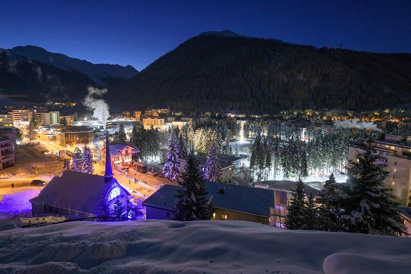 The ski resort of Davos is seen at sun rise on the the second day of the World Economic Forum. Fabrice Coffrini / AFP