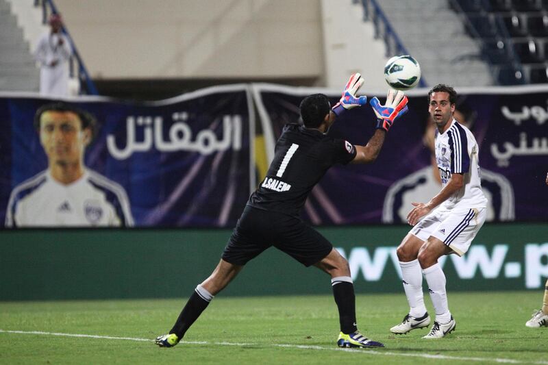 Dubai, UAE, October 10, 2012:

Al Ain went into Dubai's home stadium and properly dismantled the team. After ending the first half 1-1 Al Ain came back to win 4-1. THe tide was turned after a player from the Dubai club received a red card on a goal kick.

Dubai's goalkeeper saves a bal. It was a rough night for Mr. Salem, who let 4 balls through.
Lee Hoagland/The National