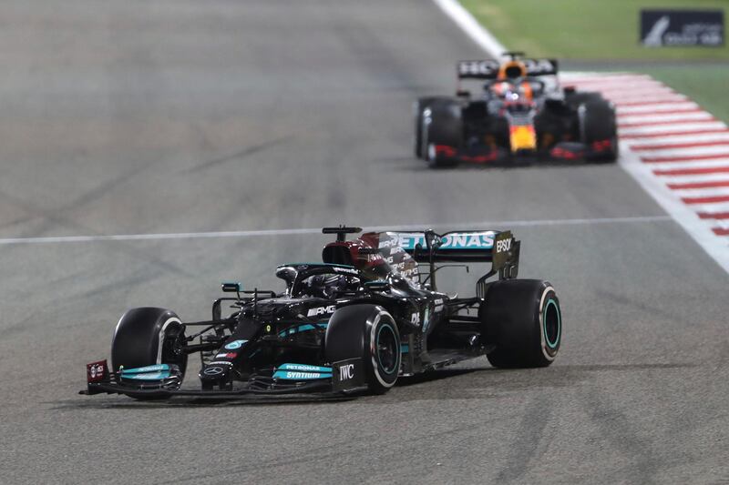 Mercedes driver Lewis Hamilton steers his car followed by Red Bull driver Max Verstappen. AP