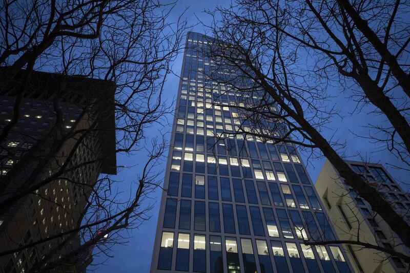 Office windows sit illuminated at the Taunusturm building complex at dusk in Frankfurt, Germany, on Thursday, March 8, 2018. Goldman Sachs Group Inc., JPMorgan Chase & Co. and Morgan Stanley are on a hiring drive in Frankfurt as global investment banks race to establish new headquarters inside the European Union in time for Brexit. Photographer: Jasper Juinen/Bloomberg