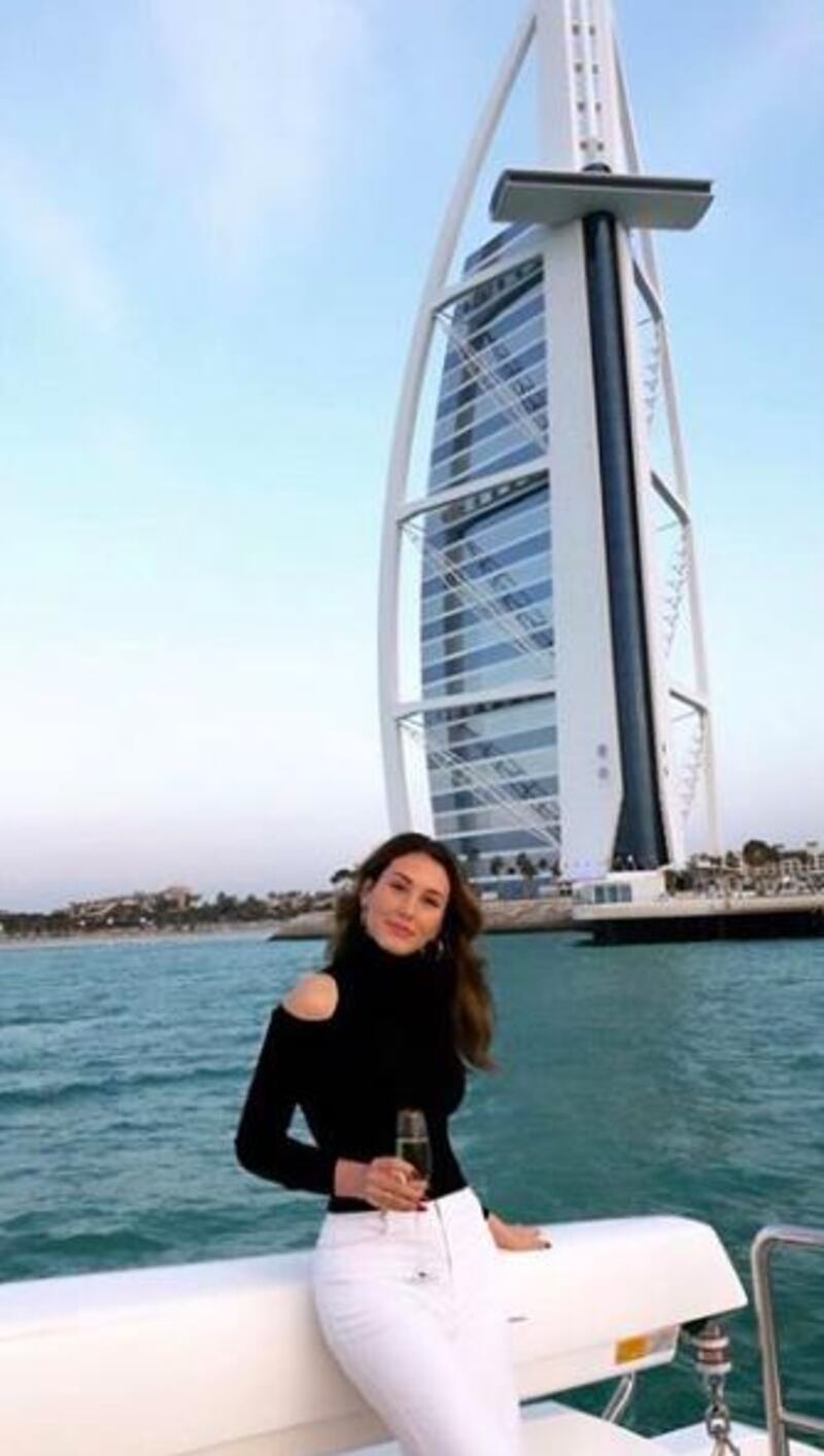 Singer Loren Allred enjoying a yacht ride with a Burj Al Arab view. Instagram / Loren Allred