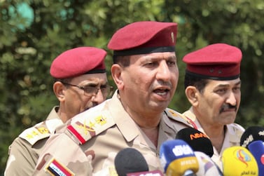 Jamil Al Shammari gives a press conference in September 2018 during his tenure as operations commander in Basra. AFP